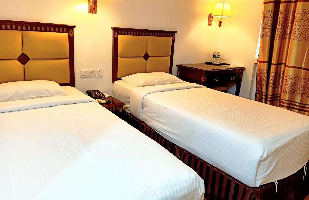 Super Oyo 90464 Borneo Suites Hotel 코타키나발루 외부 사진