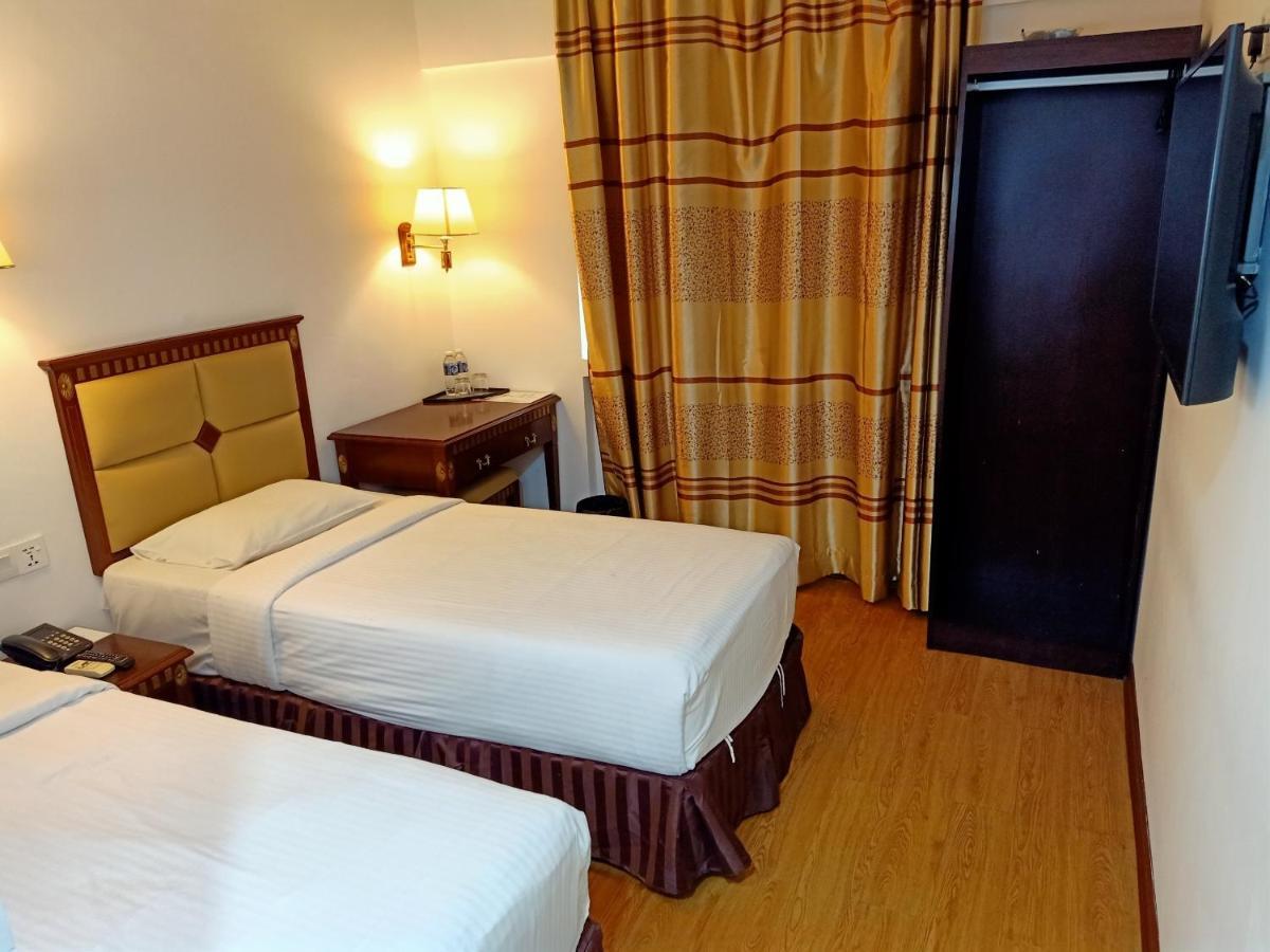 Super Oyo 90464 Borneo Suites Hotel 코타키나발루 외부 사진