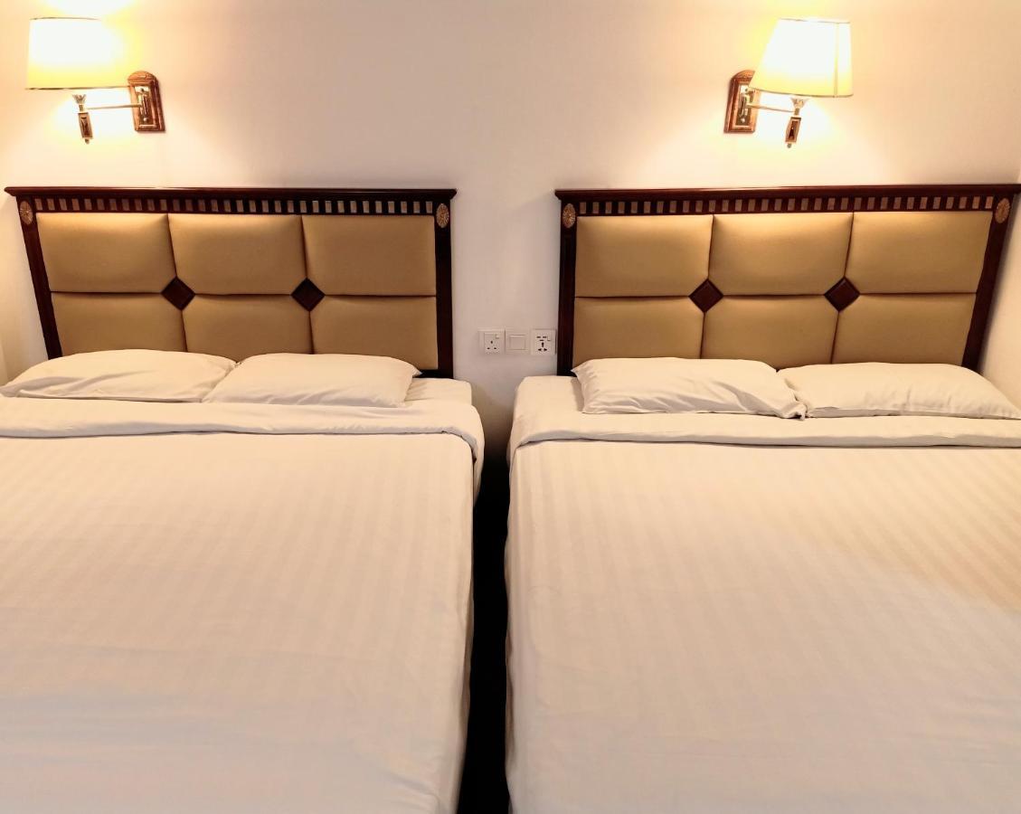 Super Oyo 90464 Borneo Suites Hotel 코타키나발루 외부 사진