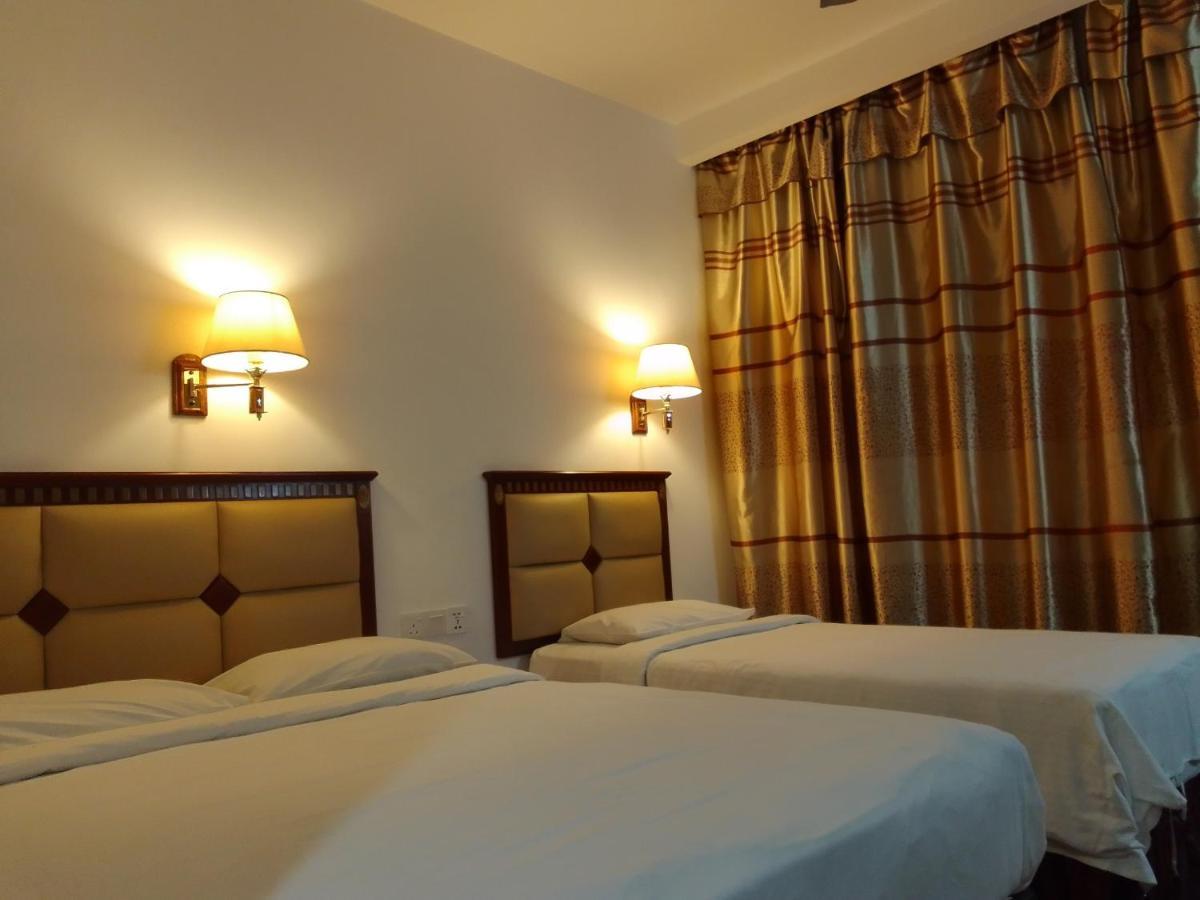 Super Oyo 90464 Borneo Suites Hotel 코타키나발루 외부 사진